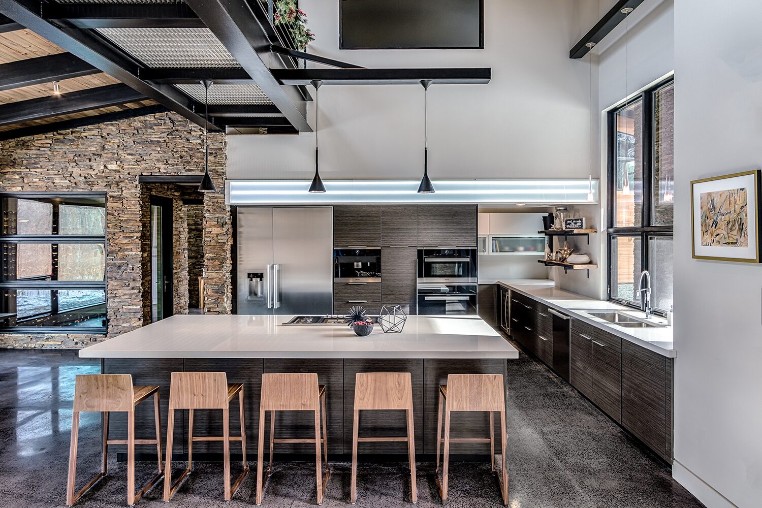 Modern custom kitchen with island and bar seating